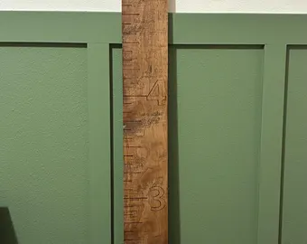 Custom wooden growth chart board with measurement numbers