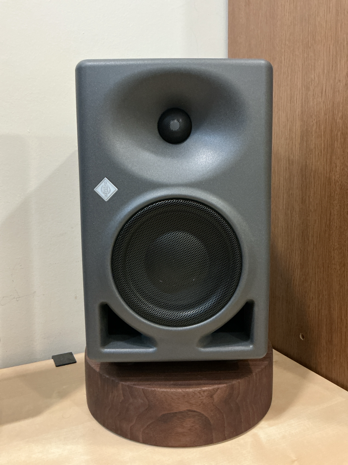 Custom walnut speaker risers made by Ballard Grain and Blade for Mahmoud